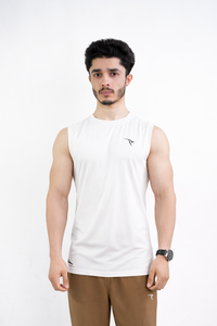 Man wearing a white sleeveless shirt and brown pants on a white background